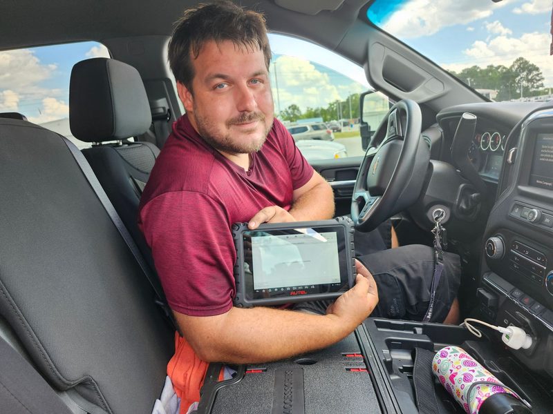 ADAS calibration diagnostic tablet used for camera recalibration on Daniel Island vehicles