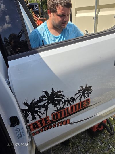 Technician performing side window glass replacement on a vehicle in Summerville