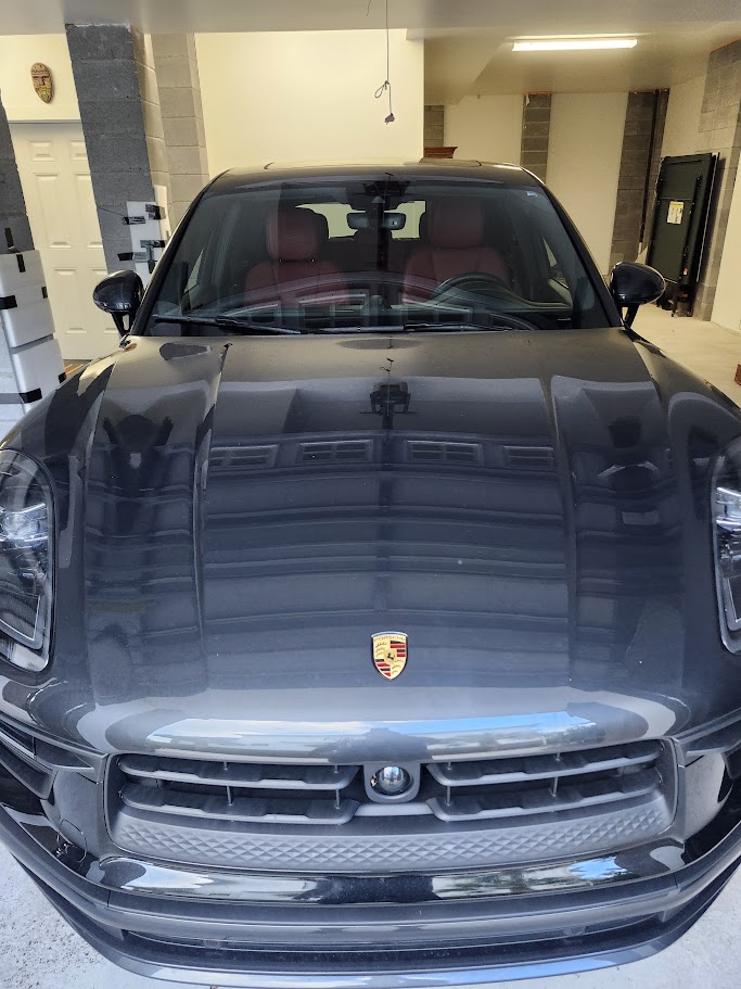 Completed windshield replacement on Porsche Cayenne luxury vehicle in Charleston SC
